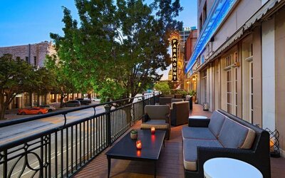 Hotel terrace with lounge seating at The Stephen F Austin Royal Sonesta Hotel
