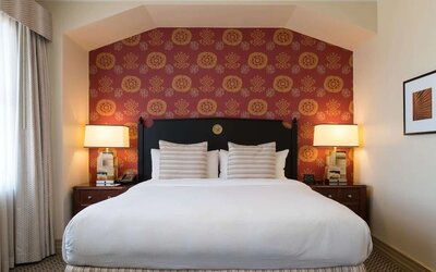 King bed at The Stephen F Austin Royal Sonesta Hotel.