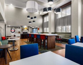 Lobby and coworking lounge at Hampton Inn & Suites Schererville.