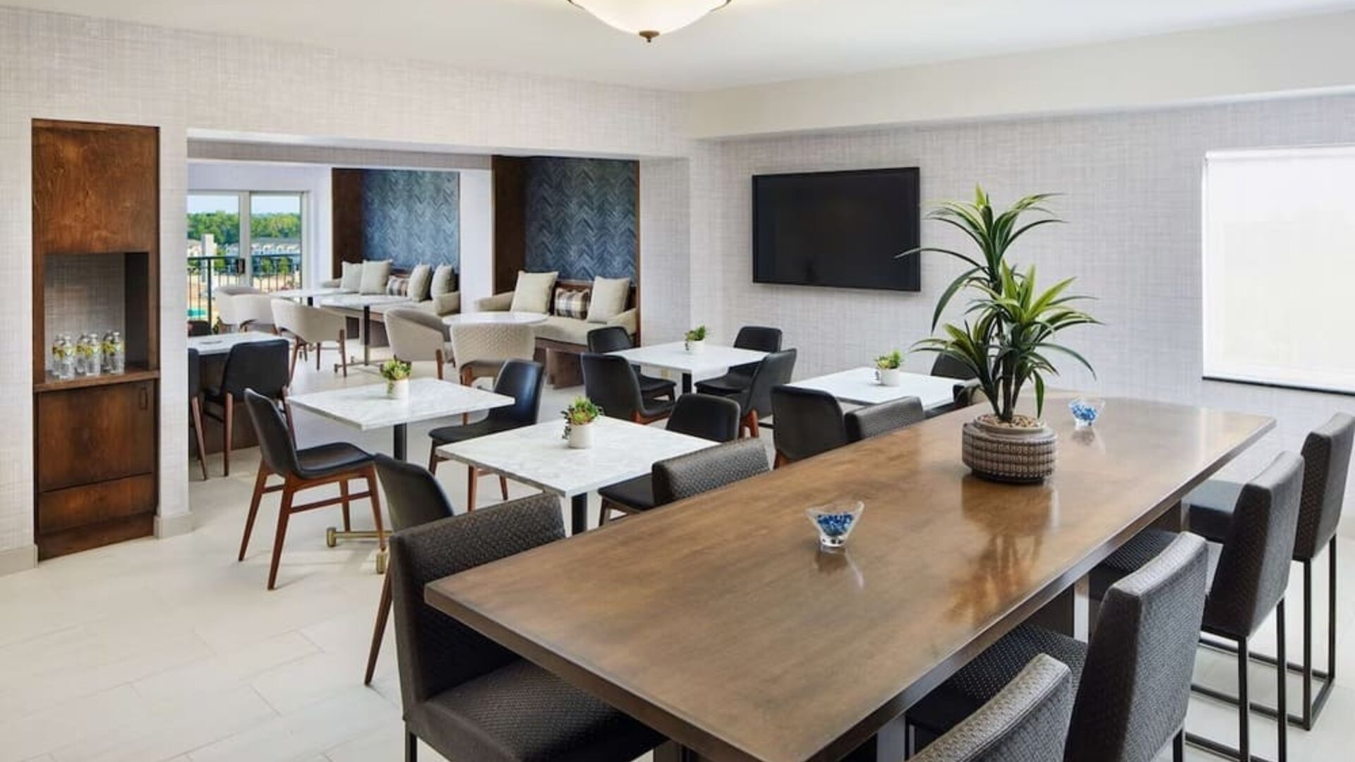 Executive lounge perfect for coworking at Hilton Charlotte Airport.
