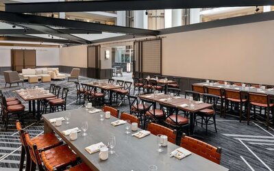 Dining area perfect for coworking at Hilton Charlotte Airport.
