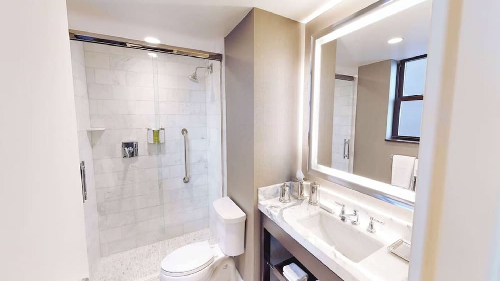 Guest bathroom with shower at Hilton Chicago.