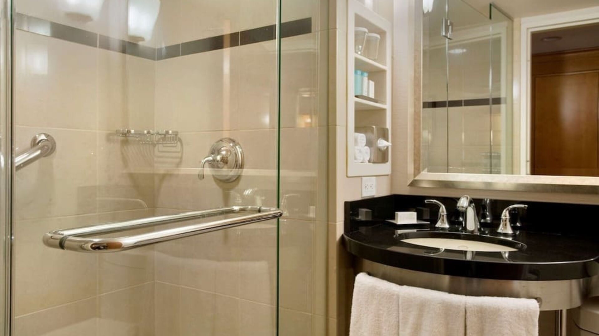 Guest bathroom with shower at New York Hilton Midtown.