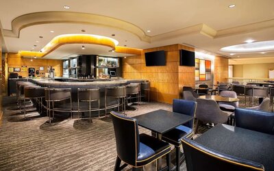 Hotel bar and lounge area at New York Hilton Midtown.