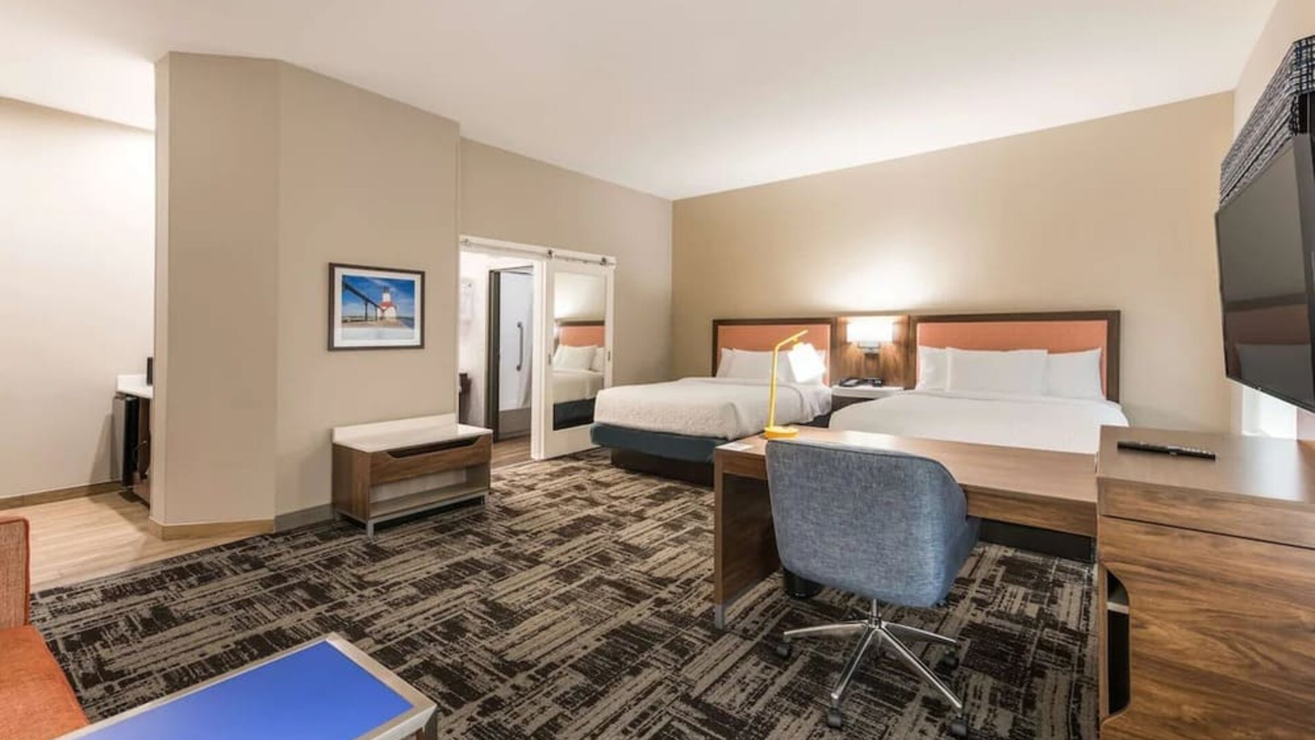 Day use twin room with workspace and private guest bathroom at Hampton Inn & Suites Benton Harbor.