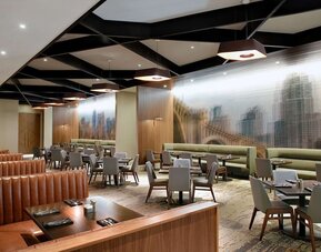 Dining area with comfortable seating at Hilton Minneapolis.