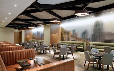 Dining area with comfortable seating at Hilton Minneapolis.