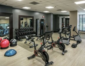 Fully equipped fitness center at Hilton Minneapolis.