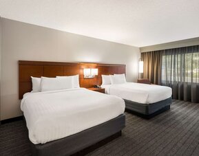Bright and spacious day use twin room with work desk at Sonesta Select San Jose Airport.