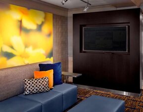 Comfortable lounge seating and workplace at Sonesta Select Boston Danvers's lobby. 