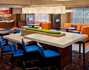 Dining area and workspace at Sonesta Select Boston Danvers.