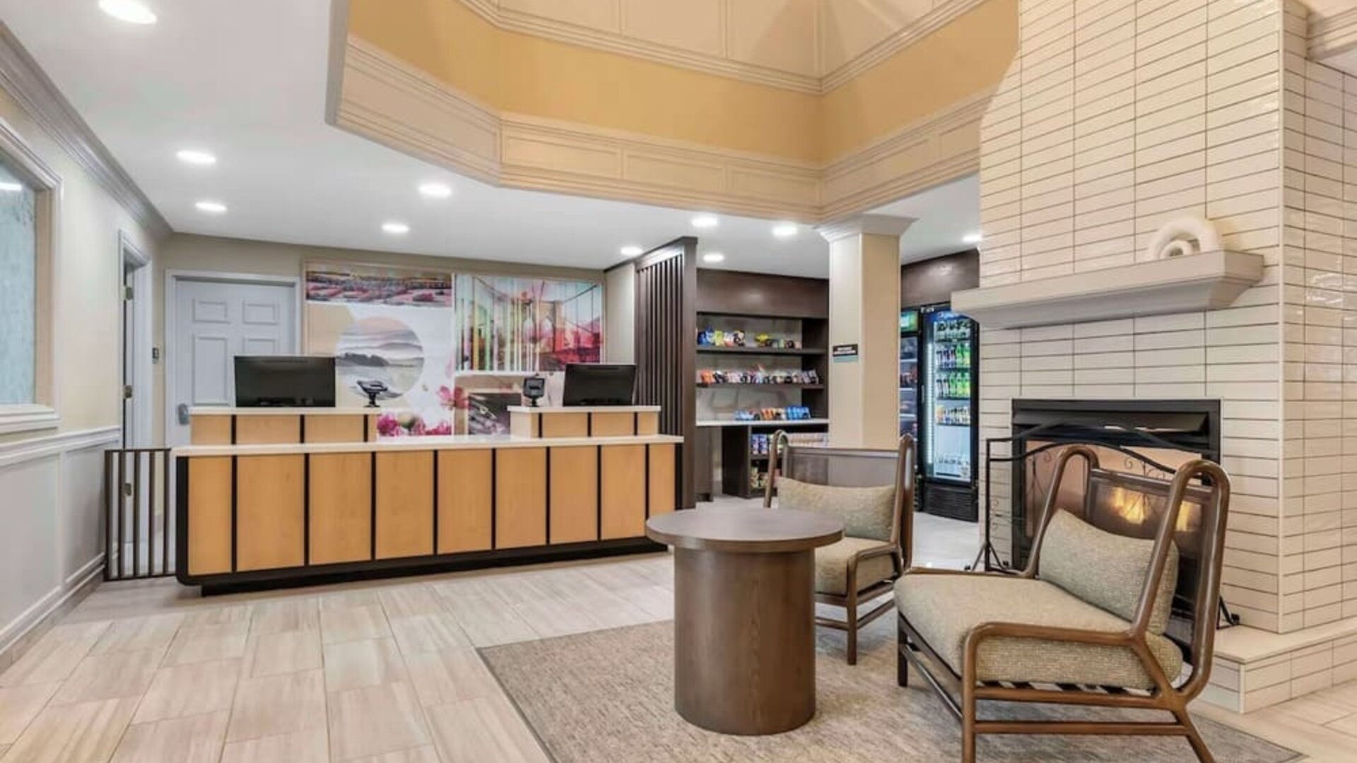 Lobby lounge with fireplace at Sonesta ES Suites Dulles Airport.