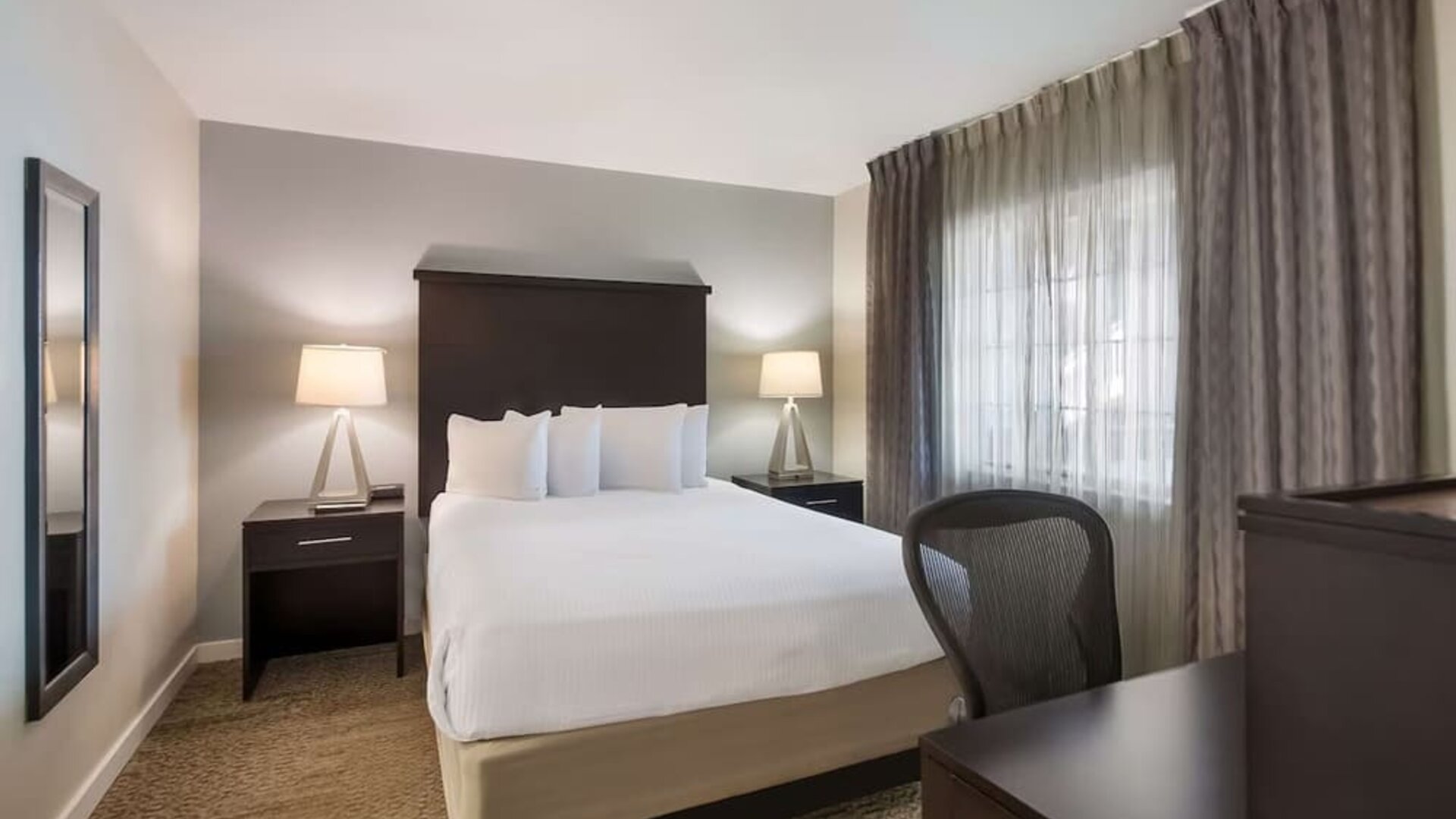 Day use room with work desk and private bathroom at Sonesta ES Suites Dulles Airport.
