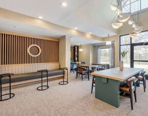 Stylish dining area at Sonesta ES Suites Dulles Airport.