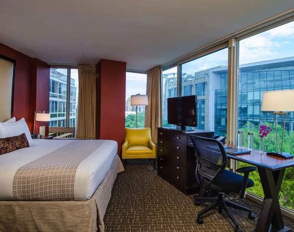 Day use room with work desk and a great view of the city at Beacon Hotel.