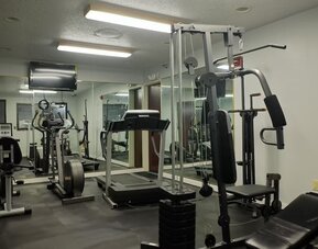 Fitness center at Quality Inn & Suites Woodstock Near Lake Geneva.