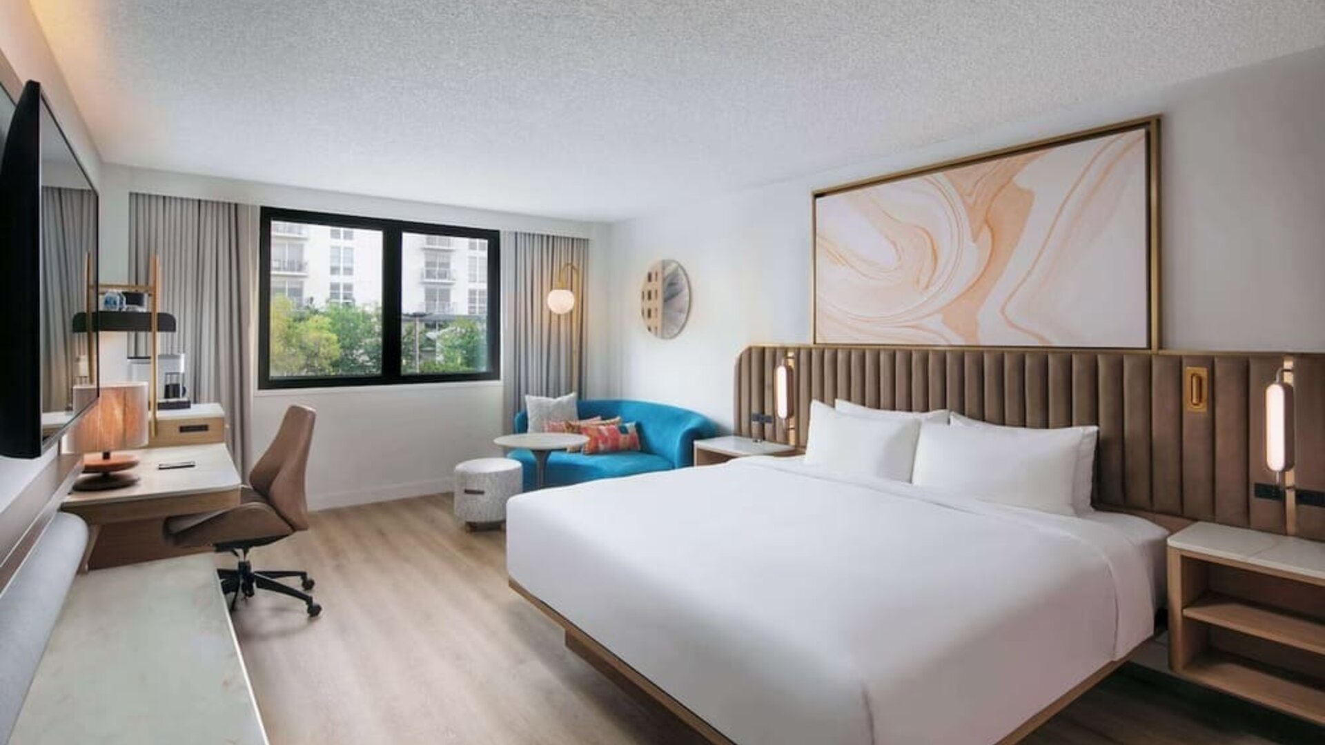 Bright and spacious day use room with work des at Sonesta Miami Airport.