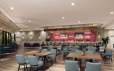 Hotel bar with lounge area at Sonesta Miami Airport.