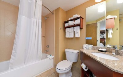Private guest bathroom with combined shower and tub at Hampton Inn Columbus-East.