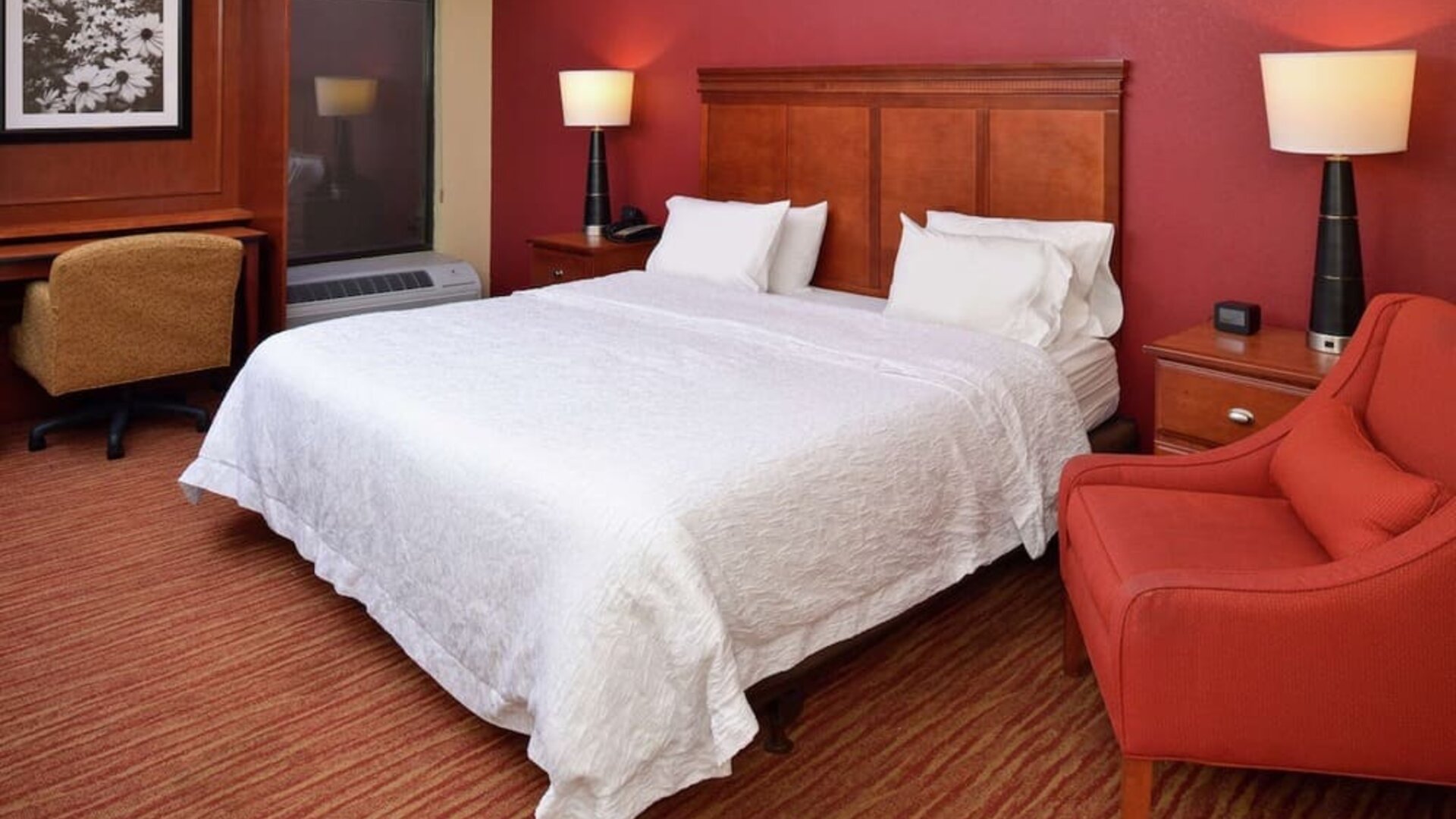 Day use room with work desk and sofa at Hampton Inn Columbus-East.