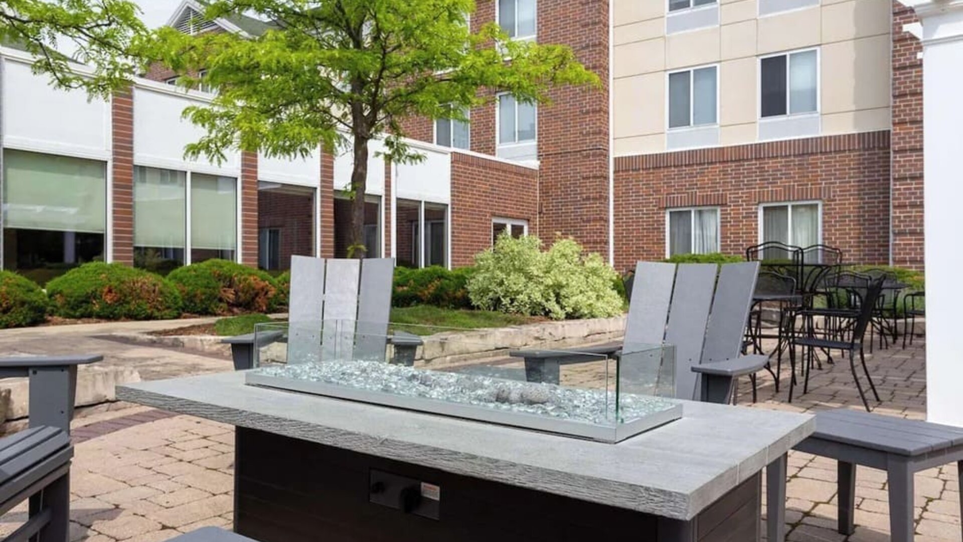 Hotel patio with lounge seating at Hilton Garden Inn Milwaukee Northwest Conference Center.