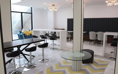 Lobby and coworking lounge at Liberty View Brooklyn Hotel.