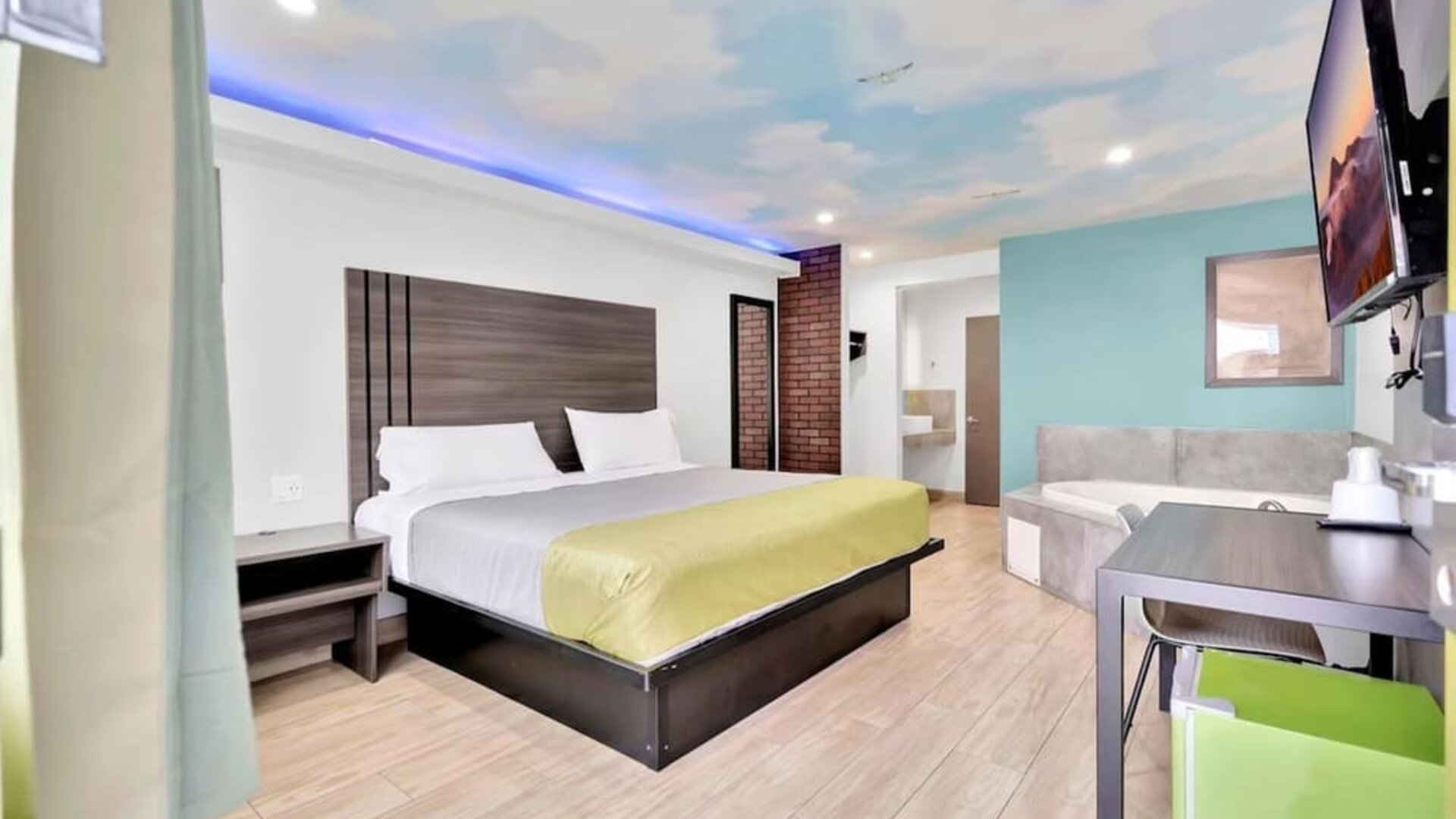 Day use room with TV at Exclusivo Inn & Suites. 