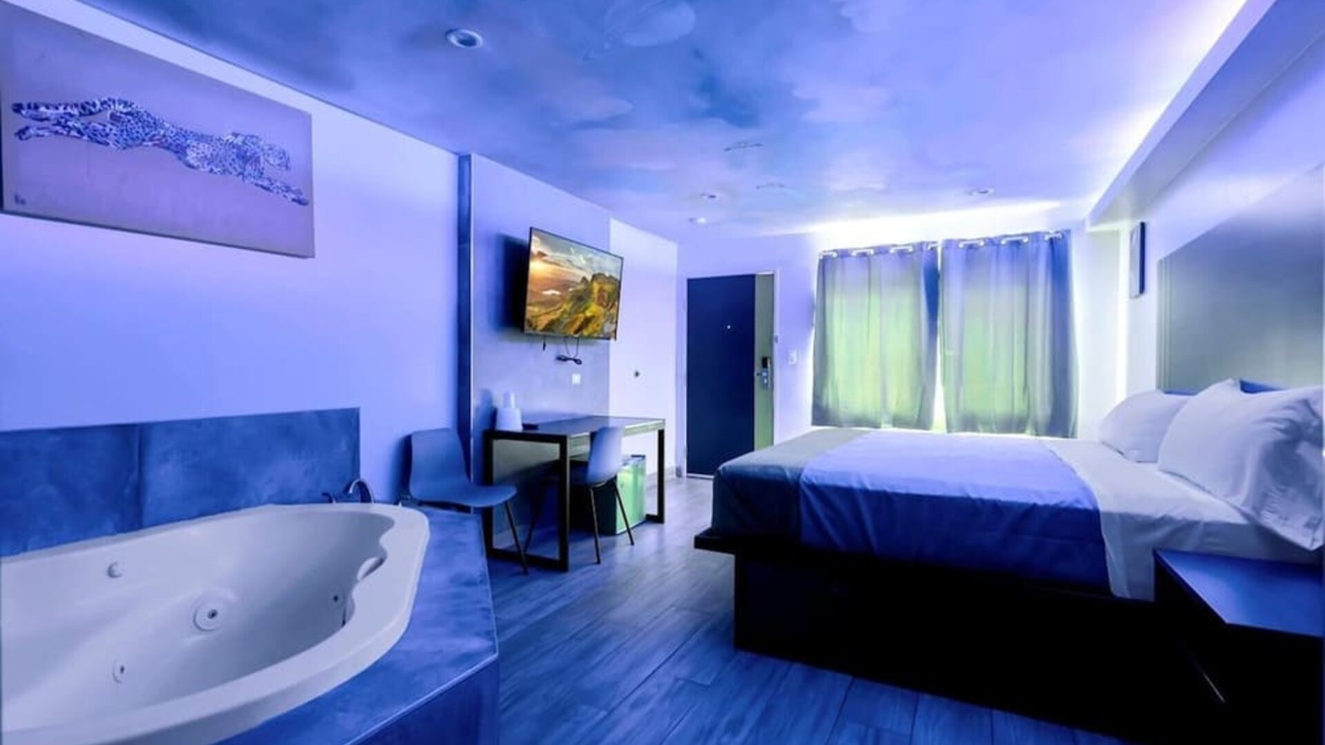 Day use room with TV at Exclusivo Inn & Suites. 