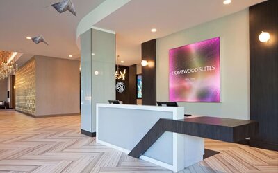 Reception desk at Homewood Suites By Hilton Los Angeles International Airport.
