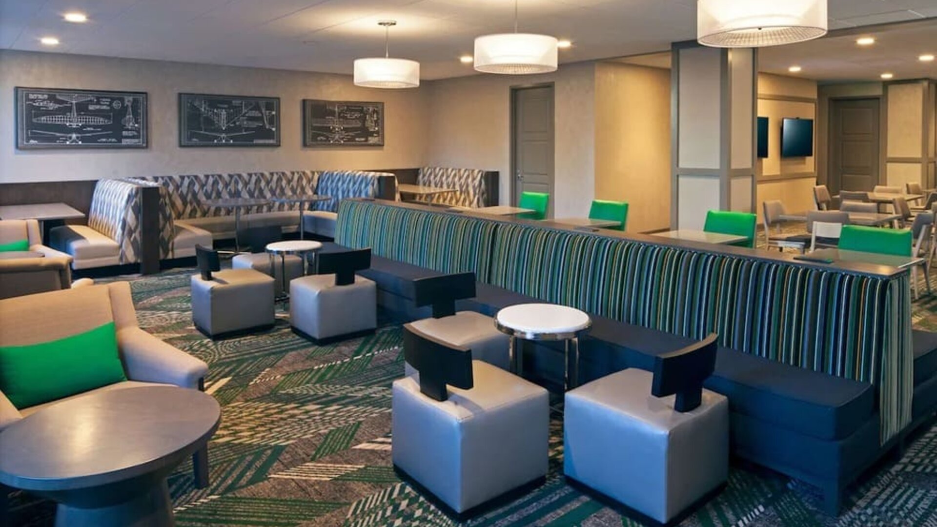 Coworking lounge at Homewood Suites By Hilton Los Angeles International Airport.