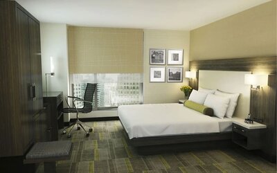 Bright and spacious day use room with work desk at Hilton Garden Inn New York/Times Square Central.