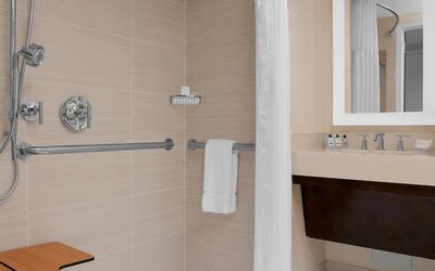 Private guest bathroom with shower at Hilton Garden Inn New York/Times Square Central