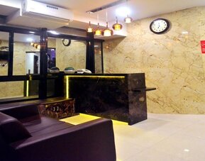 Hotel lobby seating at THE BEST HOTEL MUMBAI.