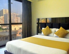 Cozy king room at THE BEST HOTEL MUMBAI.