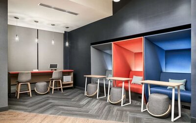 Coworking pods at Tru By Hilton Ft. Lauderdale Airport.