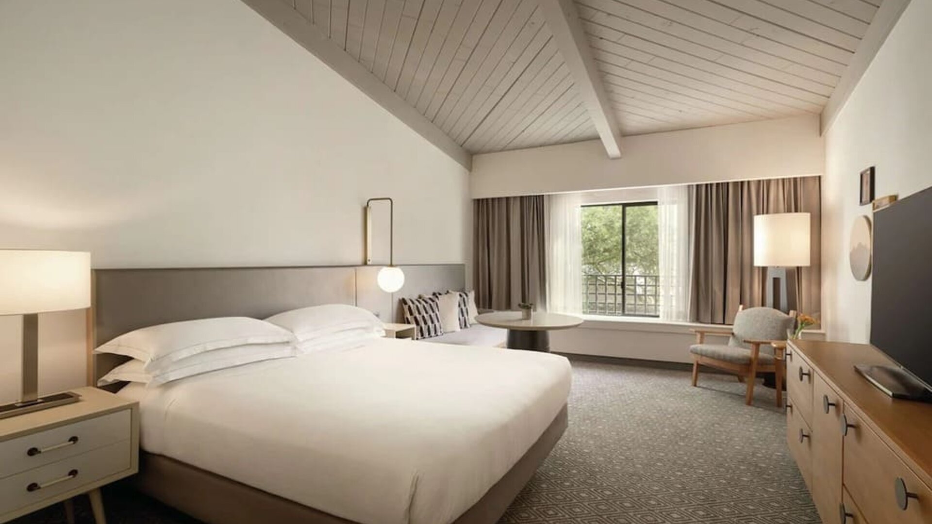 Bright and spacious day use room with workspace at Hilton Scottsdale Resort & Villas.