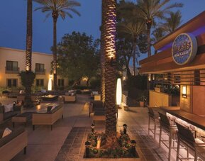 Hotel patio and pool bar at Hilton Scottsdale Resort & Villas.
