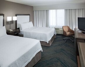 Day use twin room with natural light, work desk, TV screen and private bathroom at Hampton Inn Los Angeles-Orange County-Cypress.