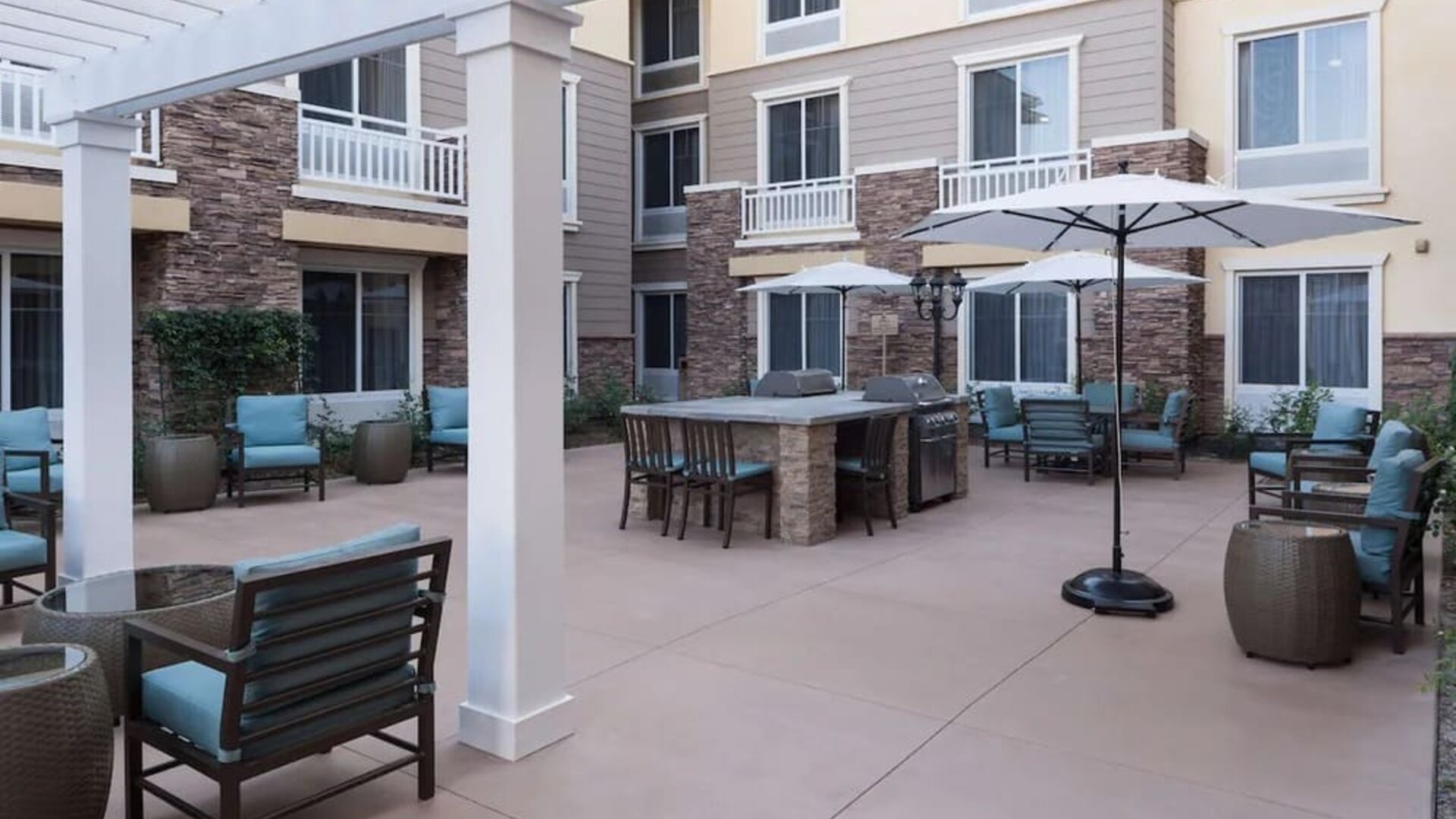 Outdoor lounge area at Homewood Suites By Hilton Agoura Hills.