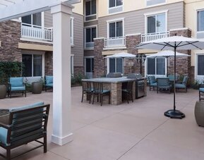 Outdoor lounge area at Homewood Suites By Hilton Agoura Hills.