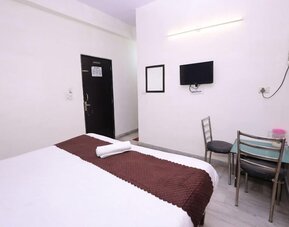 King room at Hotel NoVo Agra.