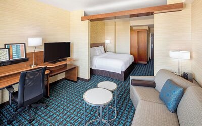 King room with work desk and TV at Fairfield Inn & Suites By Marriott North Bergen.