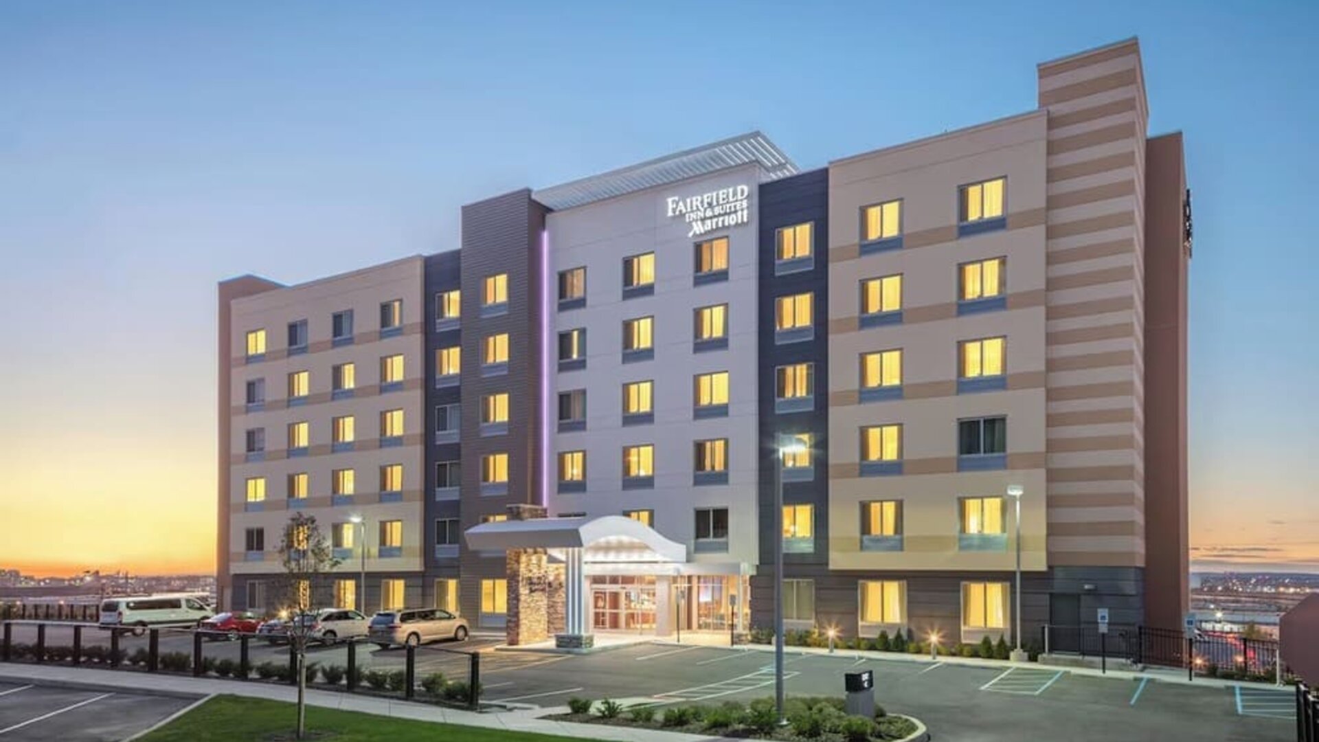 Parking and hotel exterior at Fairfield Inn & Suites By Marriott North Bergen.