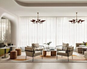 Lobby lounge and workspace at Kimpton Theta New York - Times Square.