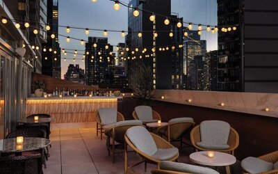 Terrace lounge area at Kimpton Theta New York - Times Square.
