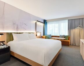 Day use room with king bed at Kimpton Theta New York - Times Square.