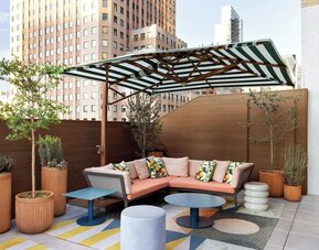 Terrace lounge seating at Kimpton Theta New York - Times Square.