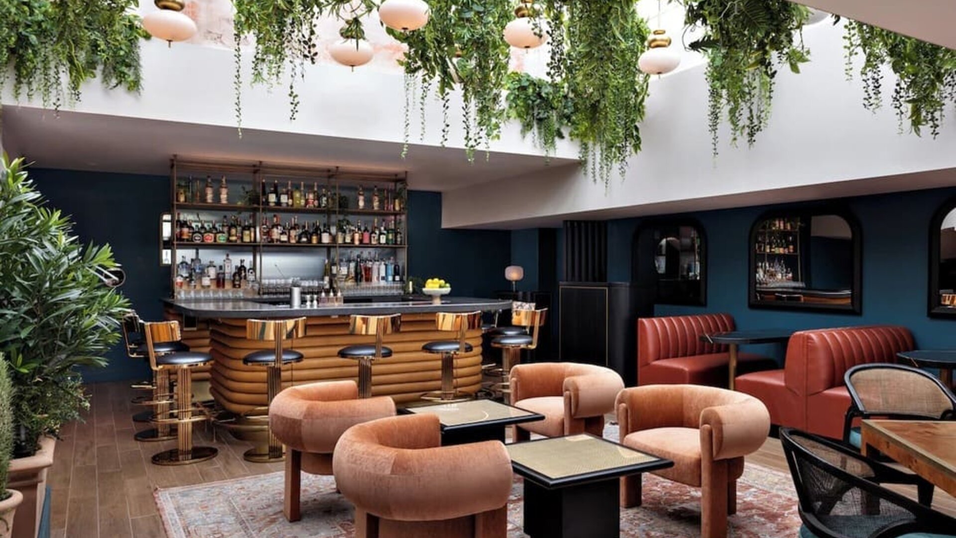 On-site bar with lounge seating at Kimpton Theta New York - Times Square.