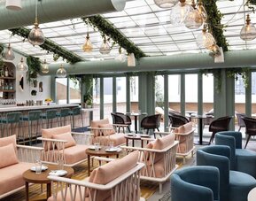 On-site restaurant with comfortable seating at Kimpton Theta New York - Times Square.