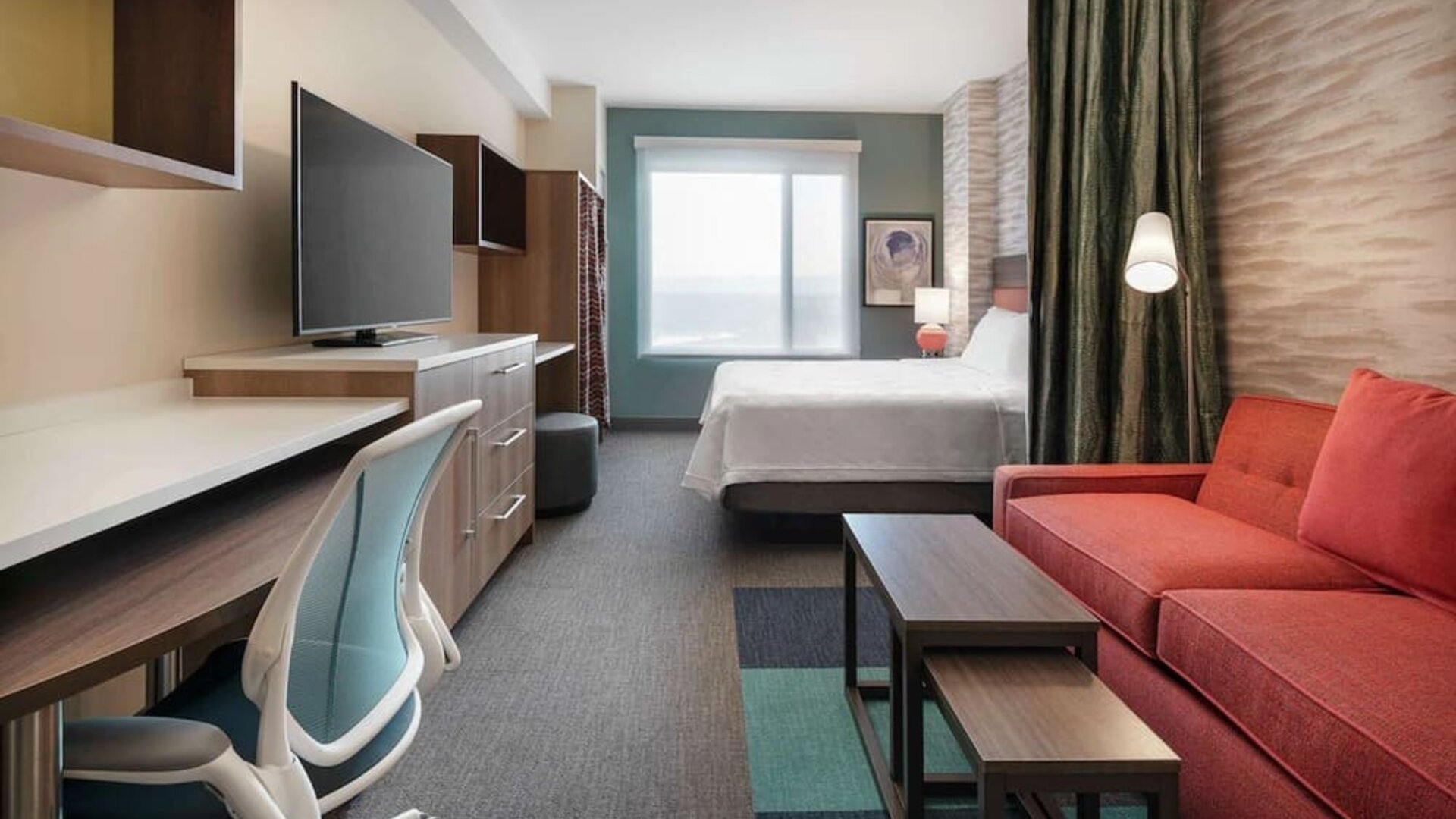 Bright and spacious day use room with workspace at 	Home2 Suites By Hilton Denver Downtown Convention Center.